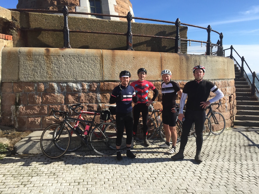 The team on the pier out into the North Sea in Sunderland - Day 2 on the C2C ride from Whitehaven to Sunderland
